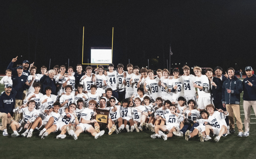 THE CHAMPIONS pose for a photo